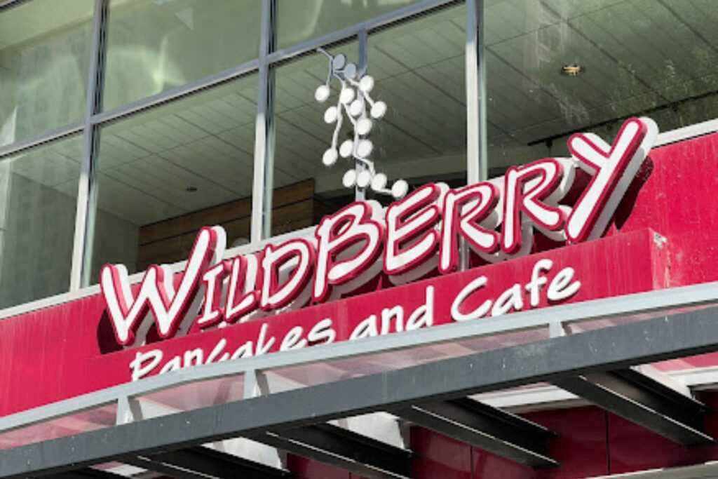 Experiencing Chicago 2022 2 Wildberry Pancakes and Cafe sign on building exterior in Chicago